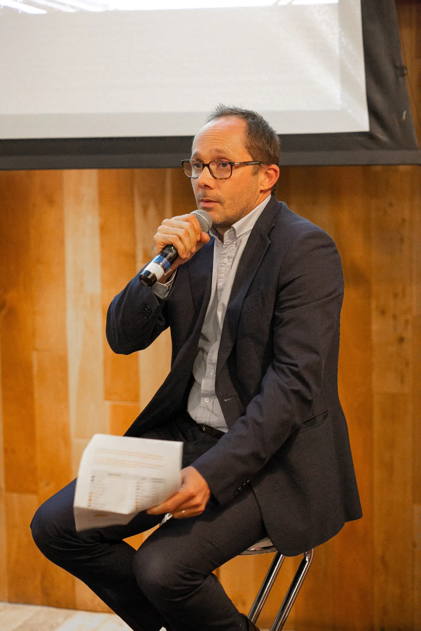 Speaker addressing a conference audience